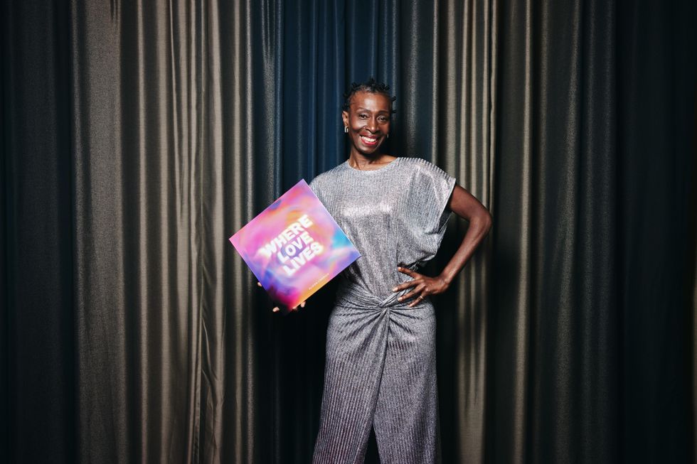 Alison Limerick holding a Where Love Lives vinyl