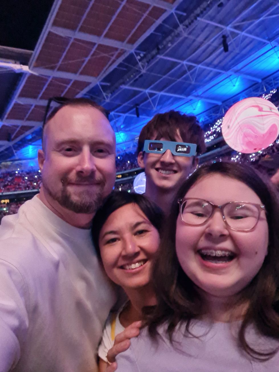 Alyssa Tapley, 16, right, at a Coldplay concert with father James (left), mother Kiona and younger brother Liam