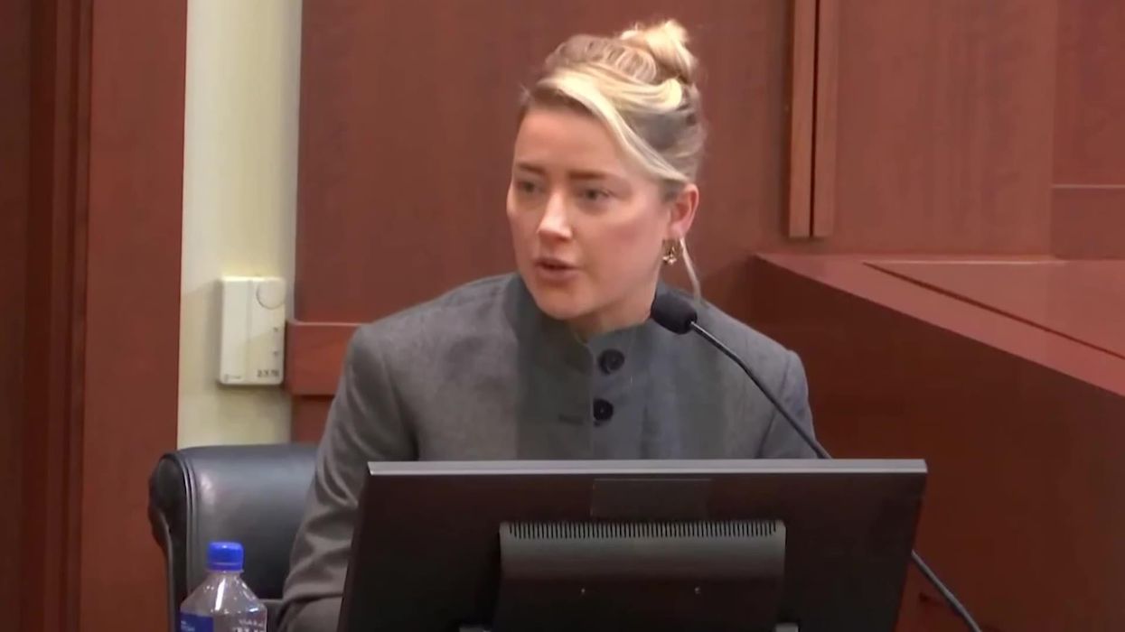 Amber Heard says dog, not her, is to blame for poop found in bed