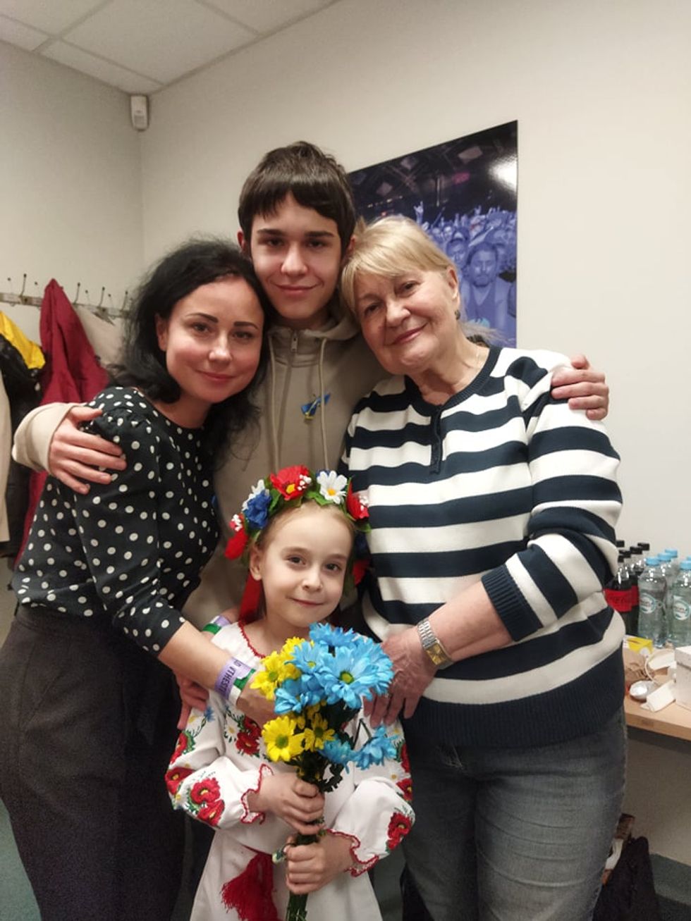 Amelia Anisovych, seven, with her mother Lilia, older brother Misha and her grandmother Vera. (Lilia Anisovych/PA)