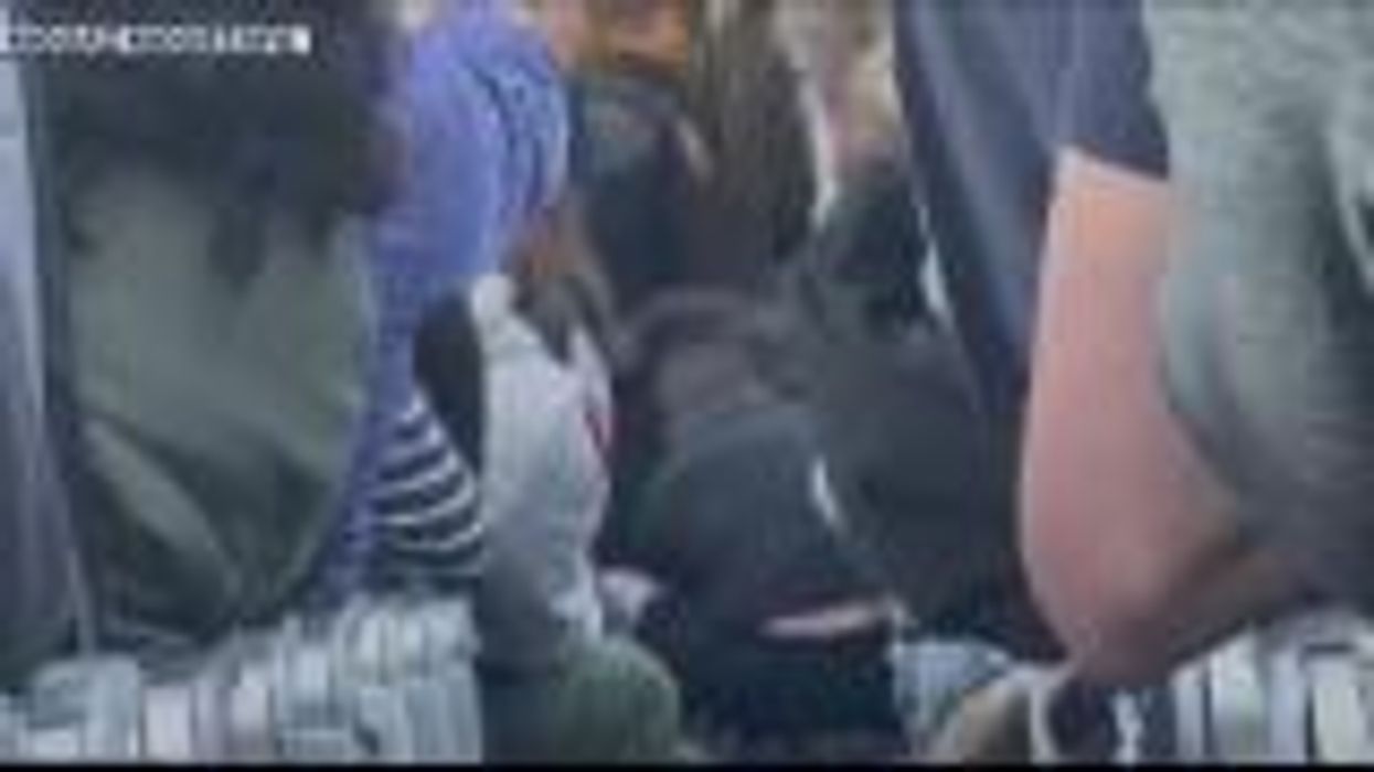 Black woman claims that she was moved to the back of plane to make room for white passengers