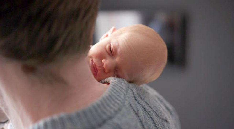 Amy sleeps on her father's shoulder