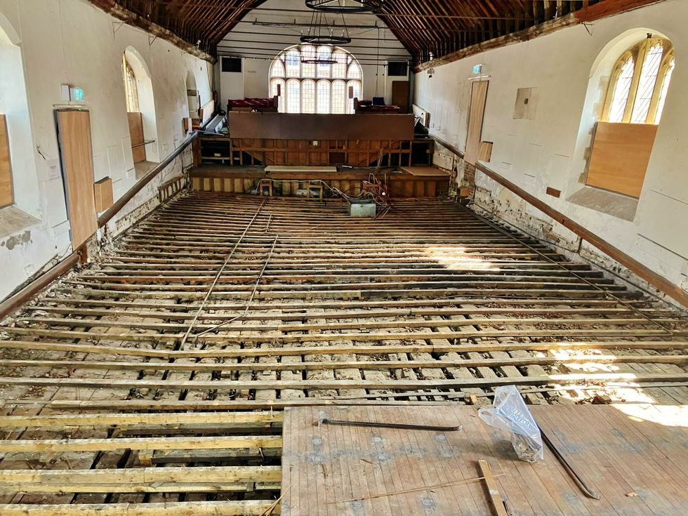 Theatre exposes historic timber floor dubbed ‘dry equivalent of the Mary Rose’