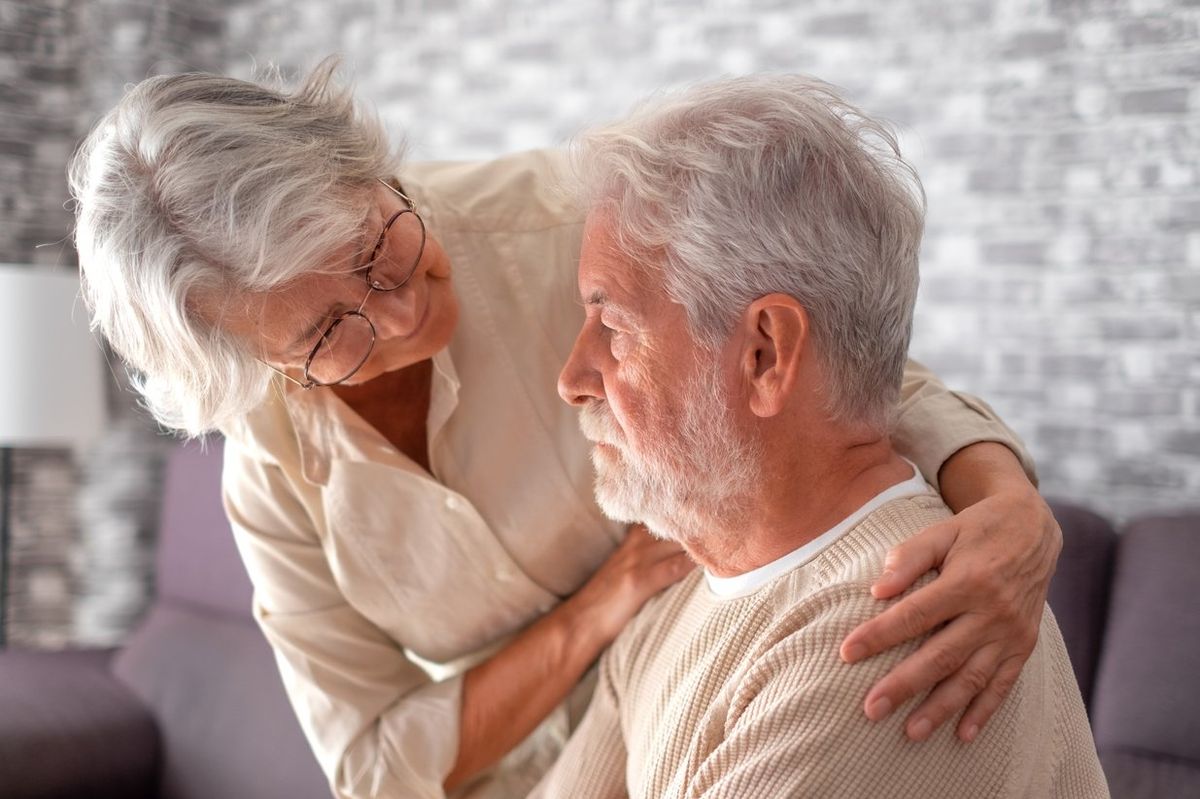 An elderly couple, where the man appears to be suffering from Dementia