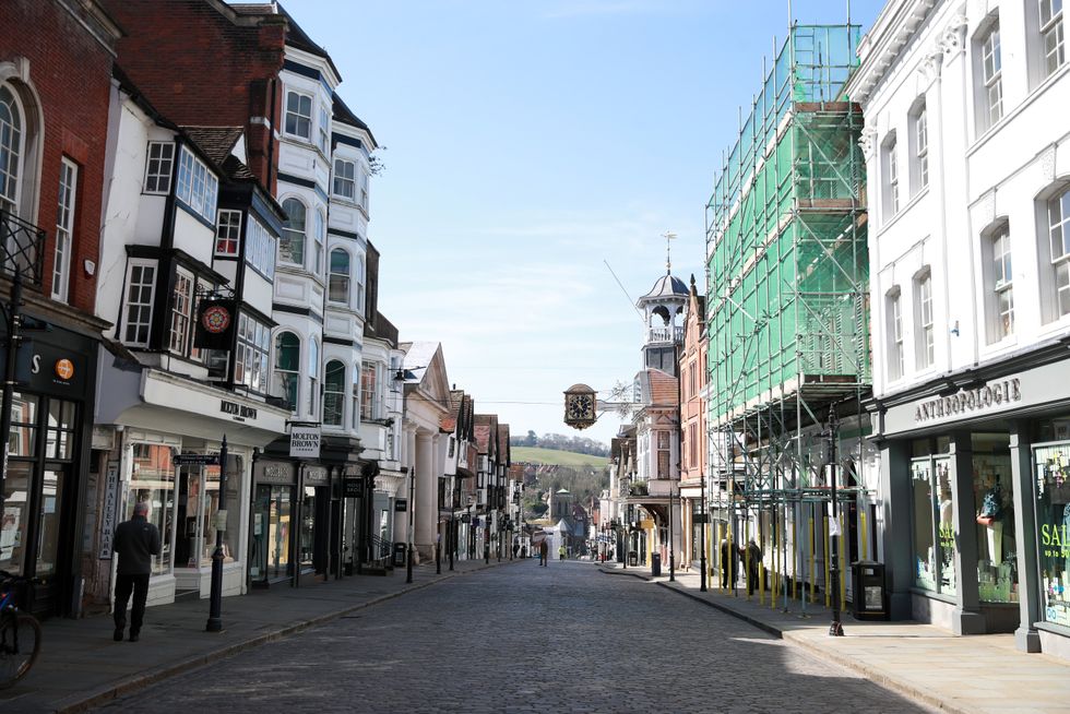 An empty high street in Guildford during lockdown. The net rate of shop closures was still lower in the first half of this year compared with a year earlier (Adam Davy/PA)