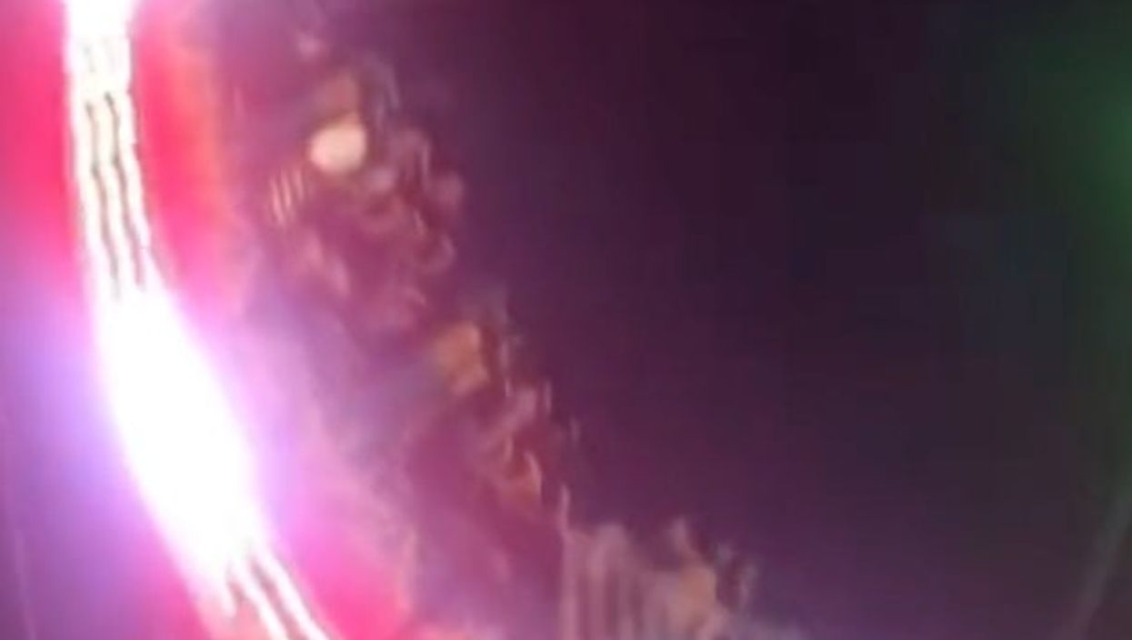 <p>An image from the chaotic aftermath of the shooting</p>