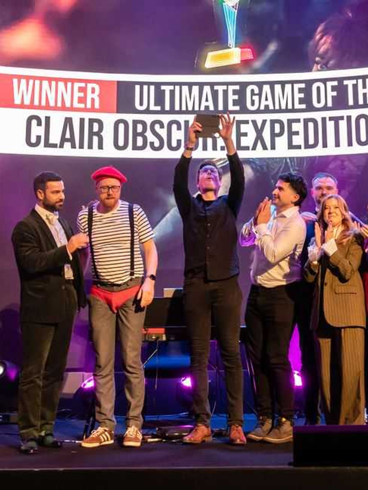 An image of Clair Obscur: Expedition 33 scooping the Ultimate Game of the Year award at The Golden Joystick Awards 2025