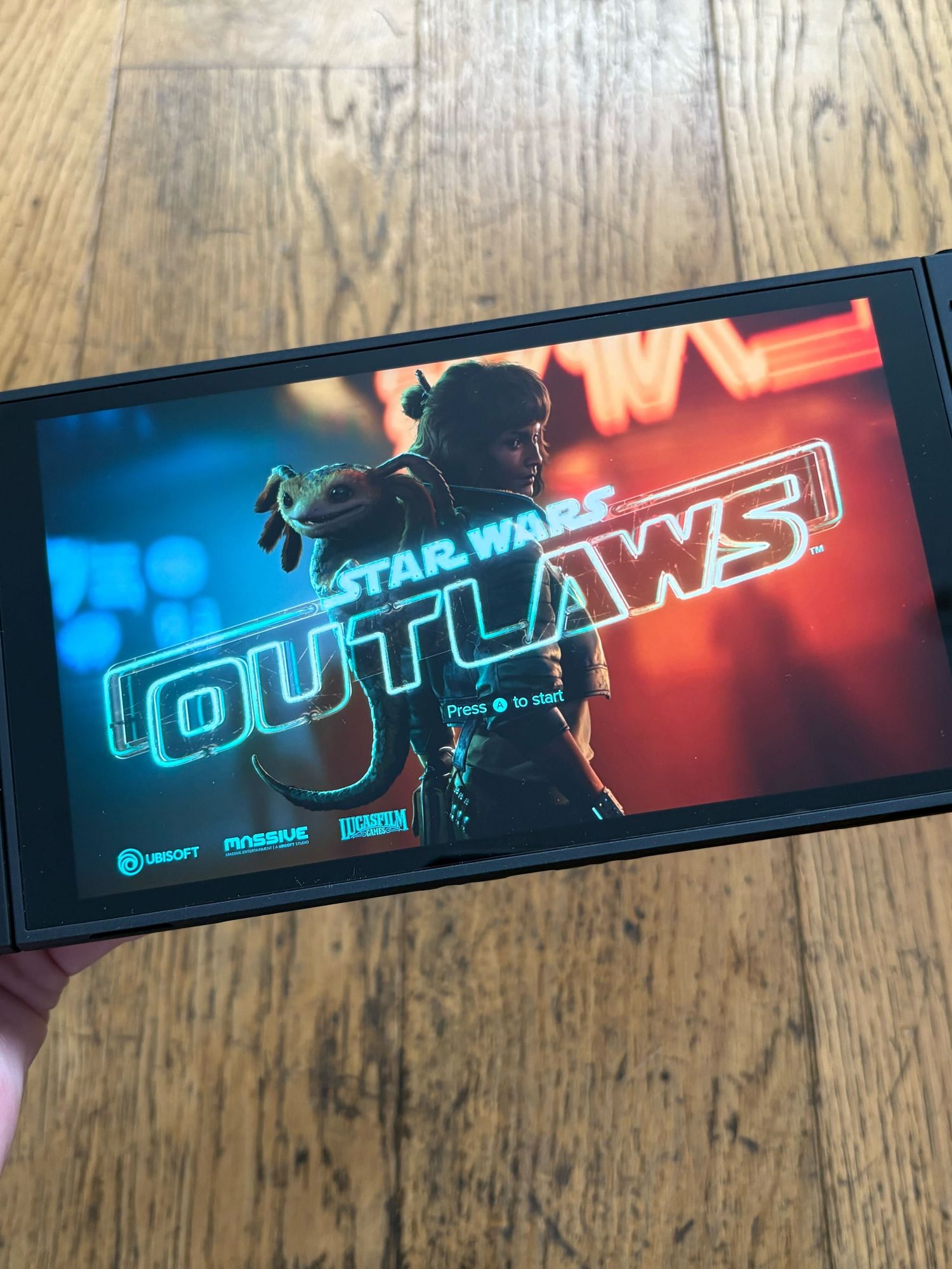 An image of the Star Wars Outlaws startup screen on Nintendo Switch 2