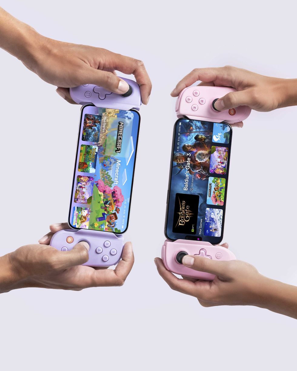 An image of two people playing the Backbone One pink edition and Backbone Pro purple edition together