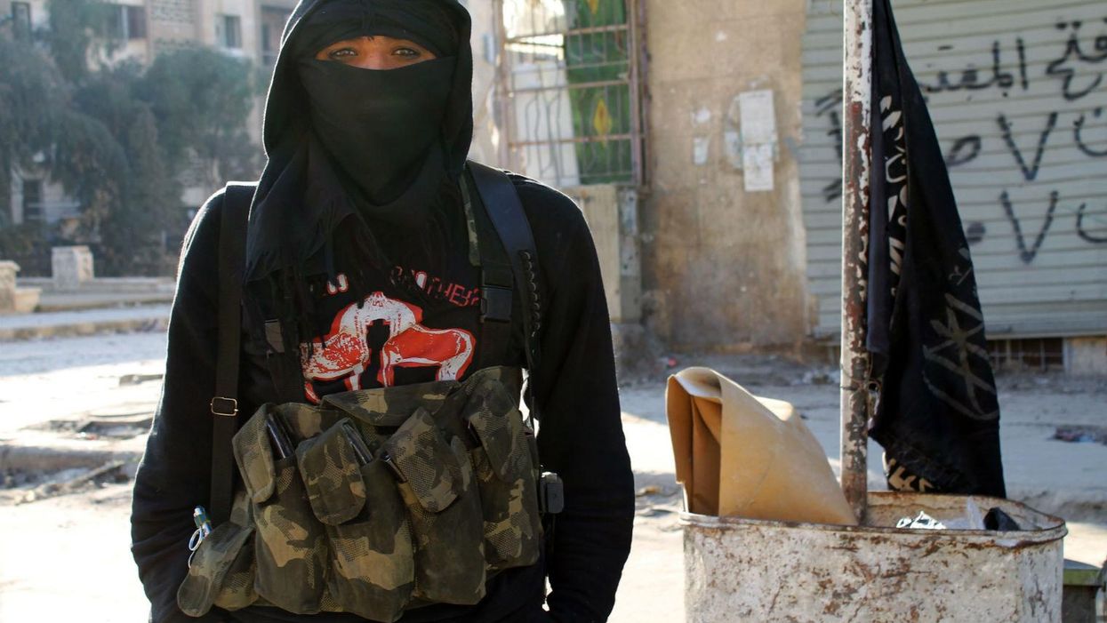 An Isis fighter on the outskirts of Aleppo, Syria, in January last year