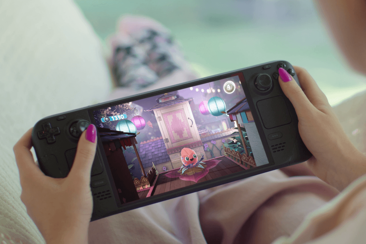 An official photograph of someone playing Sackboy on a Steam Deck OLED console
