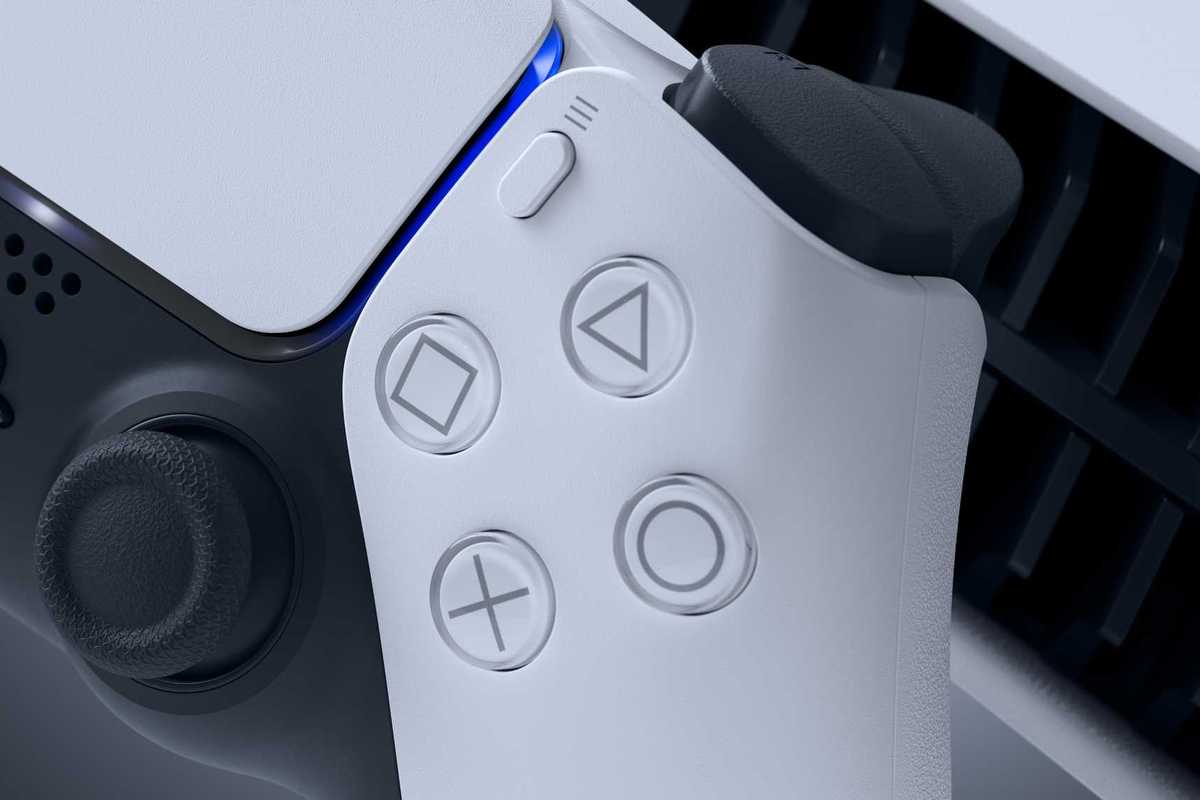 An official product image of the PlayStation DualSense wireless controller with a PS5 console in the background