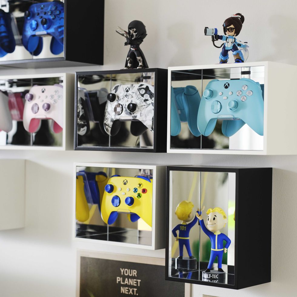 An official product image of the YXSTABY gaming controller display boxes