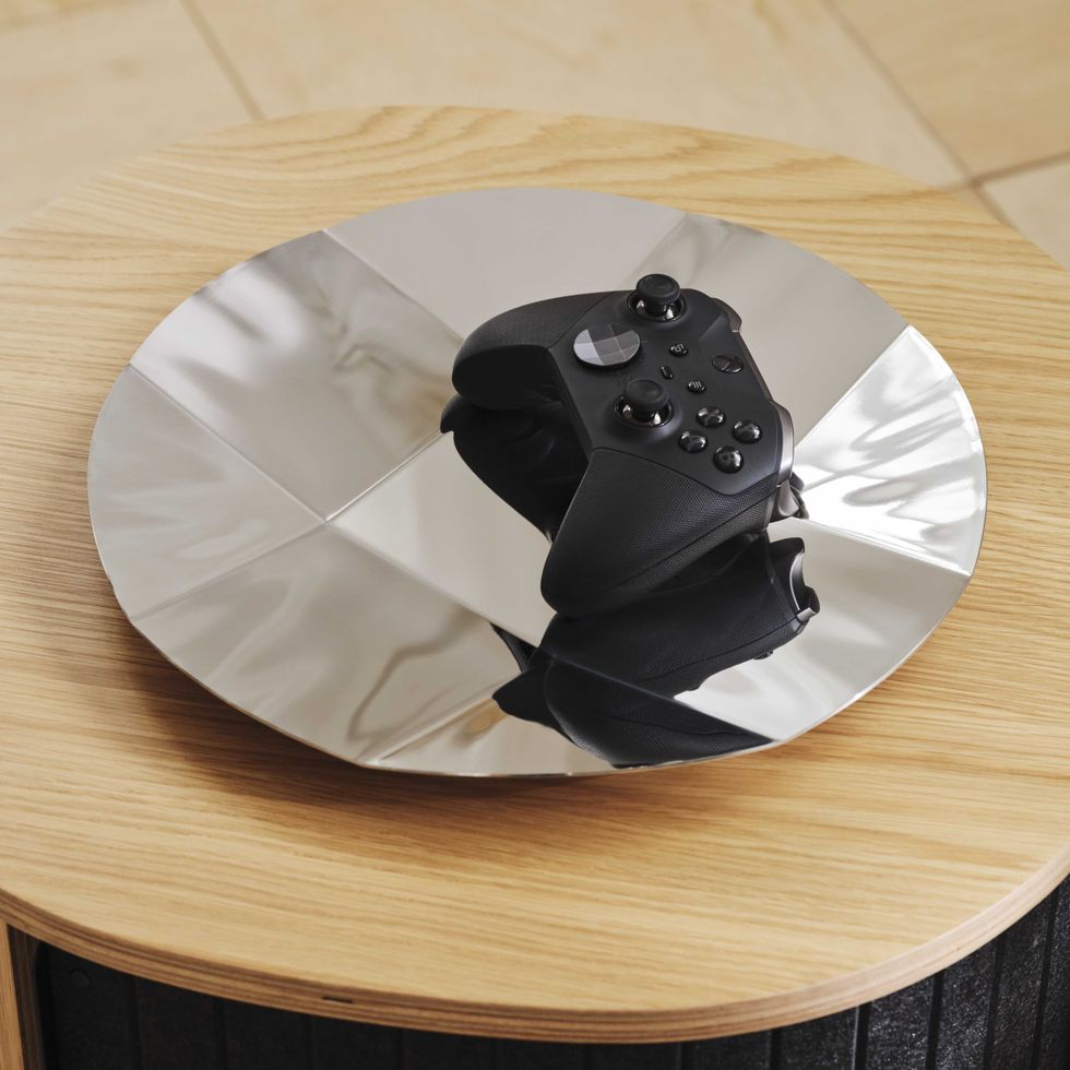 An official product image of the YXSTABY gaming D-pad platter