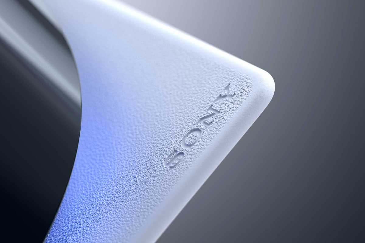 An official PS5 product image with a close-up of the Sony logo