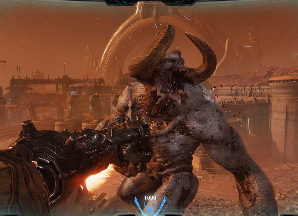 An official screenshot of Atlan Mech gameplay in DOOM The Dark Ages