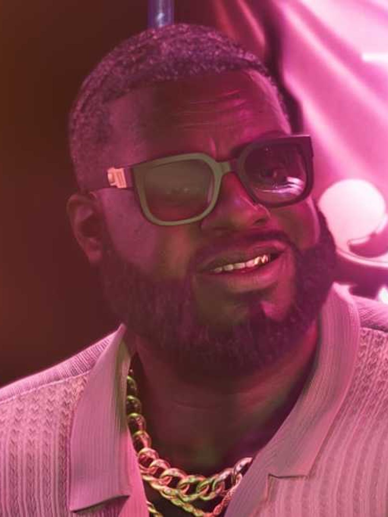 An official screenshot of Boobie Ike in a strip club in GTA 6