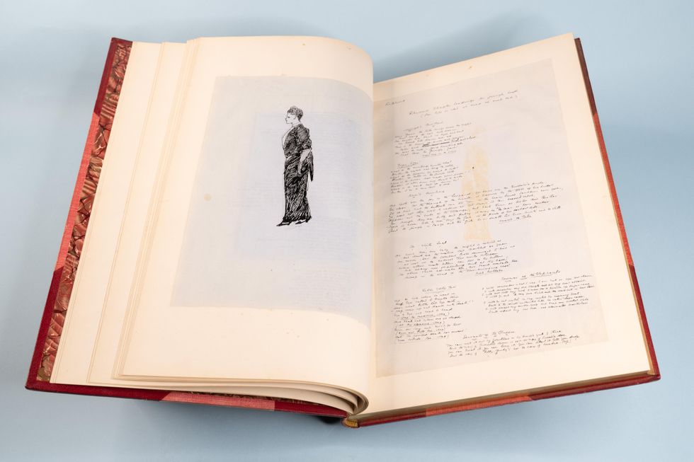 An open book with a drawing on the left page and text on the right