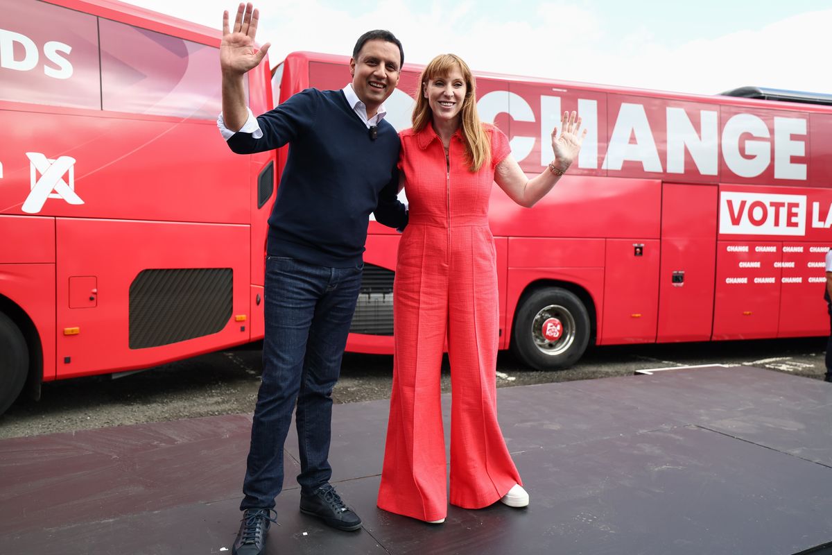 Anas Sarwar and Angela Rayner wave to camera on Labour campaign trail