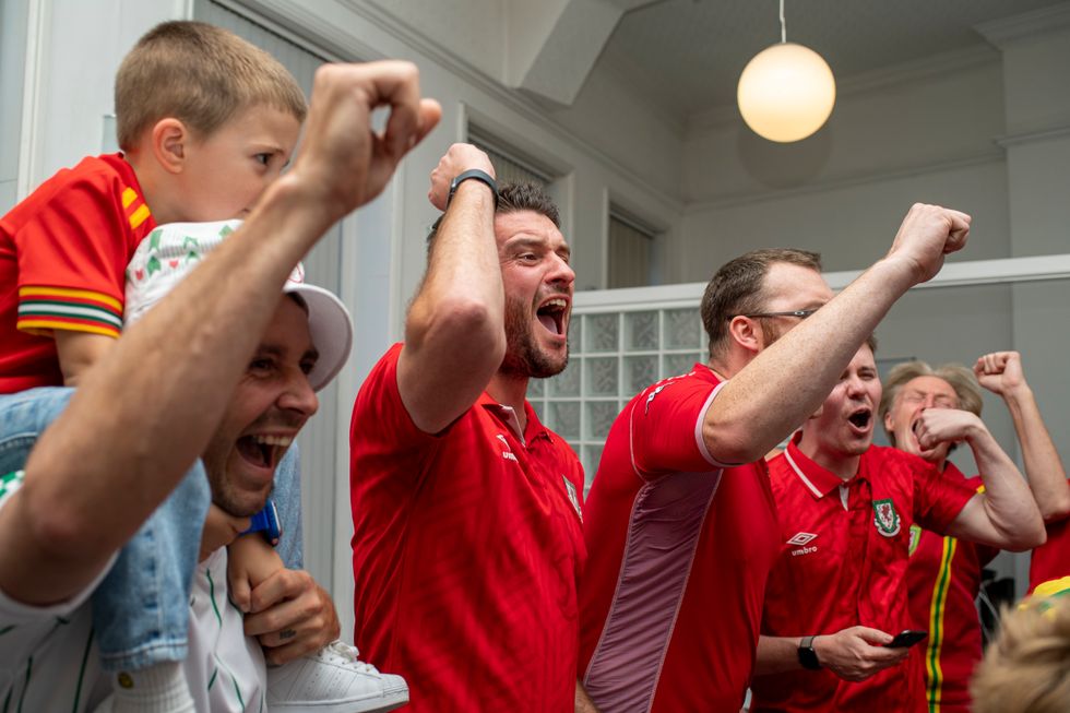 Andrew Dowling (centre) leads the chanting as they record the finishing touches to the song. (Andrew Dowling)