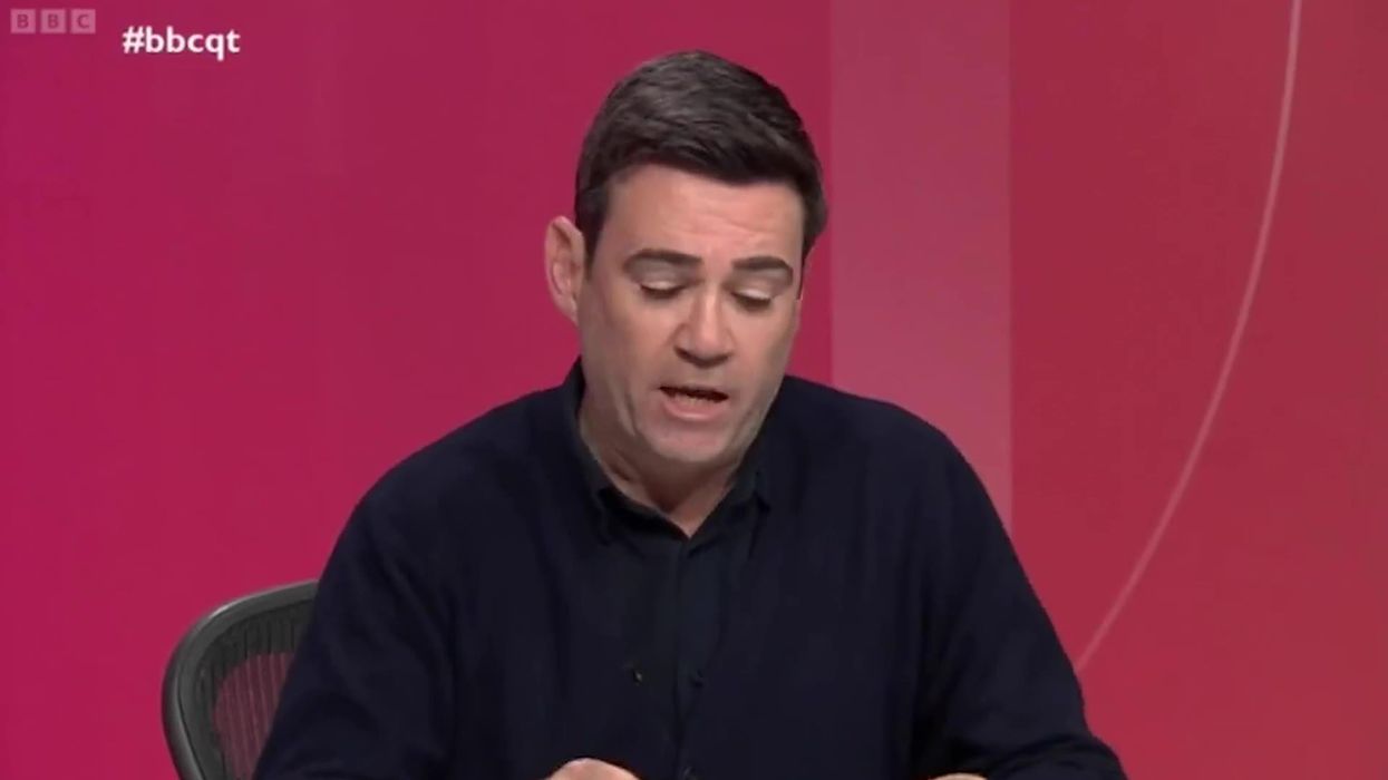 Andy Burnham receives a round of applause after saying Tories are 'playing from the Trump handbook'