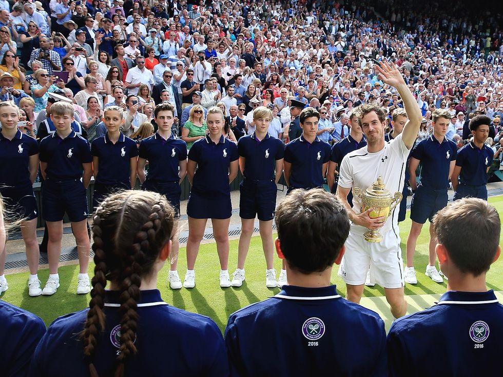 Andy Murray celebrates following his Men's Singles Final on day thirteen of the Wimbledon Championships at the All England Lawn Tennis and Croquet Club, Wimbledon