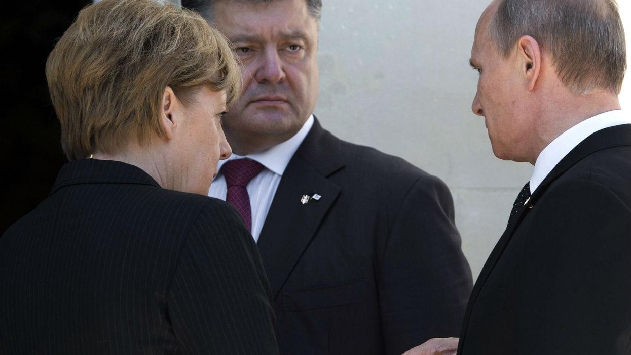 Angela Merkel, with Ukrainian president Petro Poroshenko and his Russian counterpart Vladimir Putin