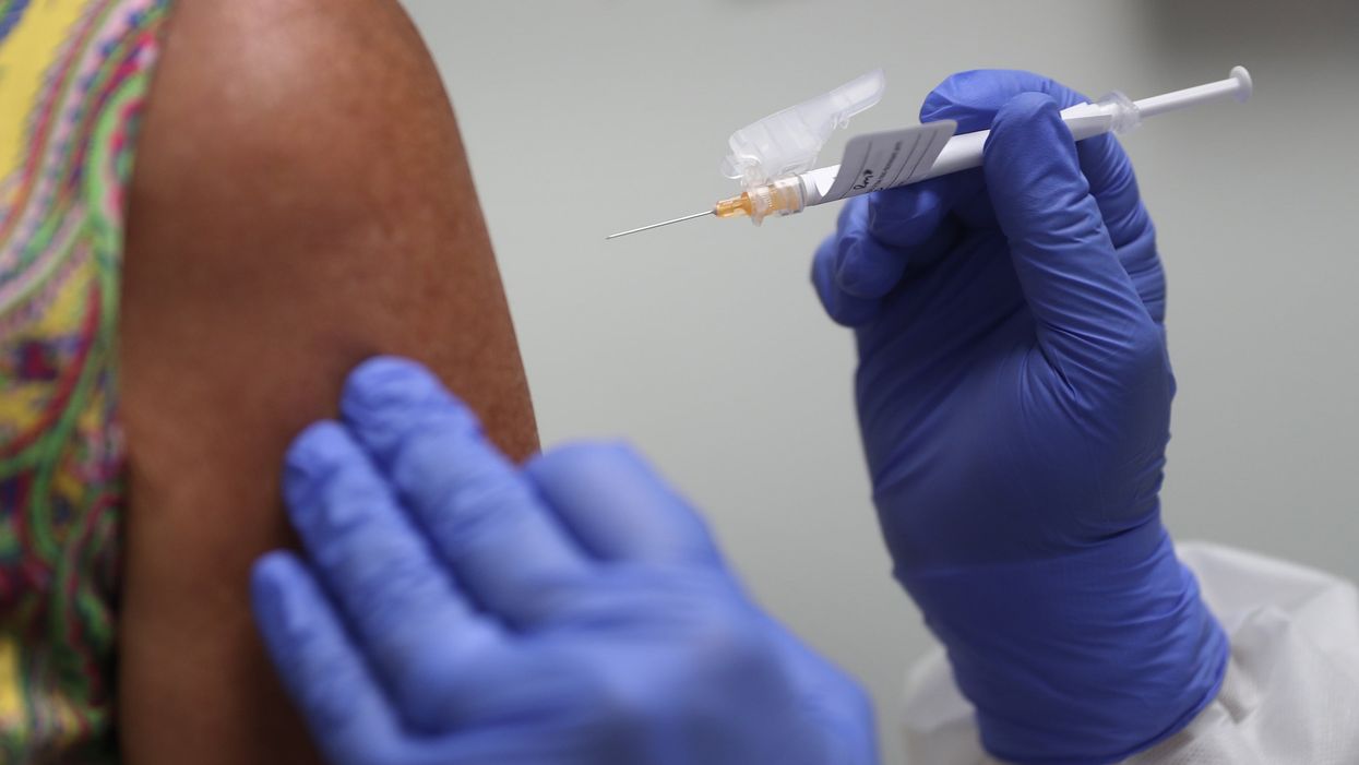 <p>Anthony Fauci urged people to put aside their political differences and get the vaccine </p>