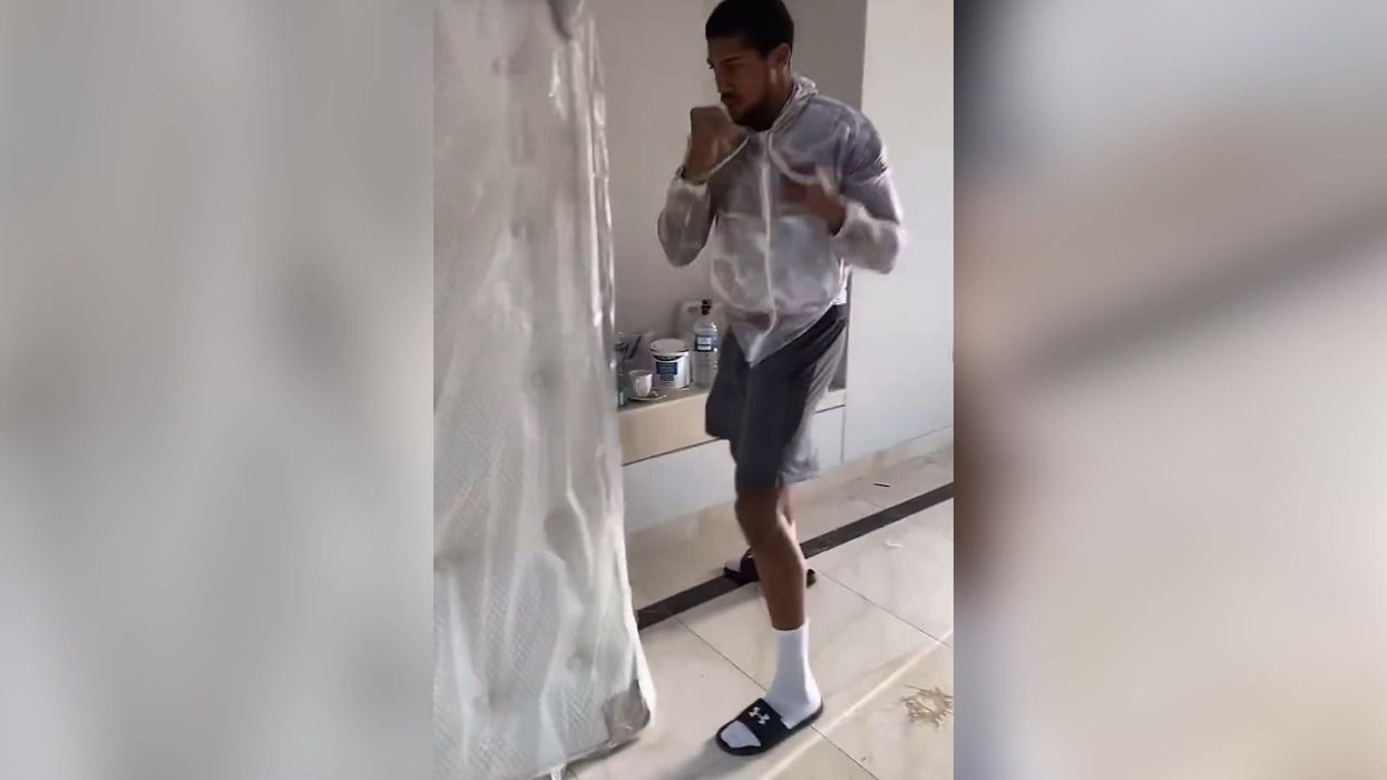Anthony Joshua uses mattress as a punch bag to train for his next big fight