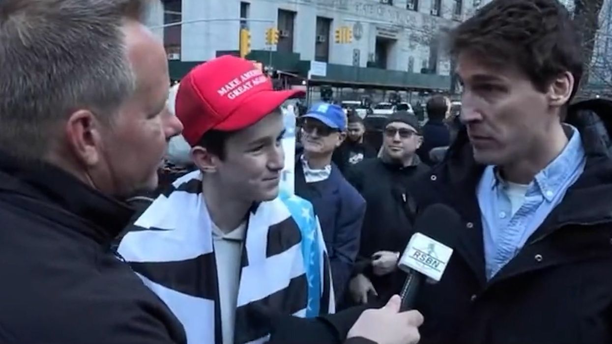 Anti-Trump protester flawlessly infiltrates live news interview as 'fan'