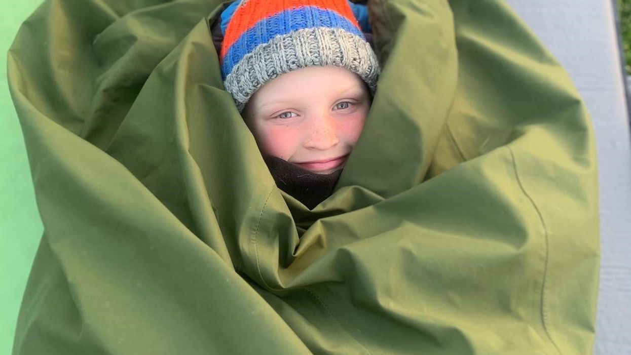 Archie Tunstill, aged eight, is to spend 100 nights sleeping in a bivvy bag in his garden in Suffolk for the Captain Tom 100 (Poppy Tunstill/PA)