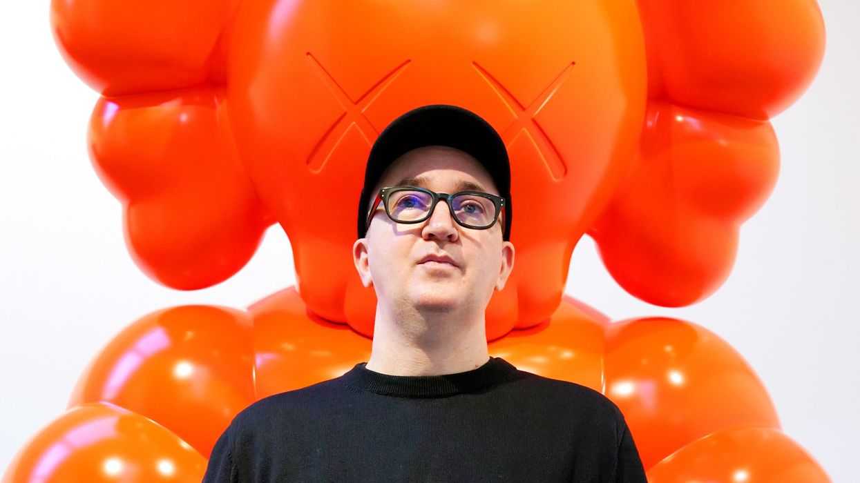 Artist Kaws during a photocall at Serpentine North for his first major solo exhibition in London (Jonathan Brady/PA)