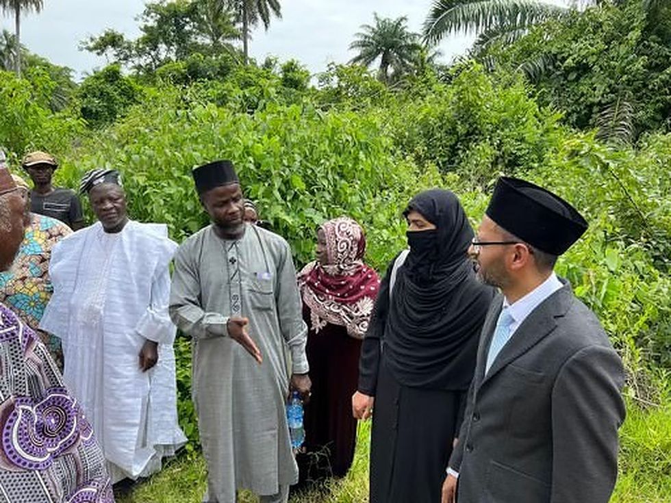 British Muslim woman overseeing experimental farm at Islamic convention in UK