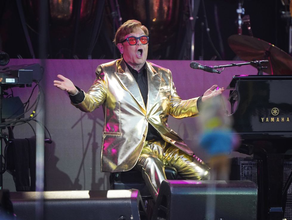 Sir Elton John putting piano, jumpsuit and platform boots up for auction