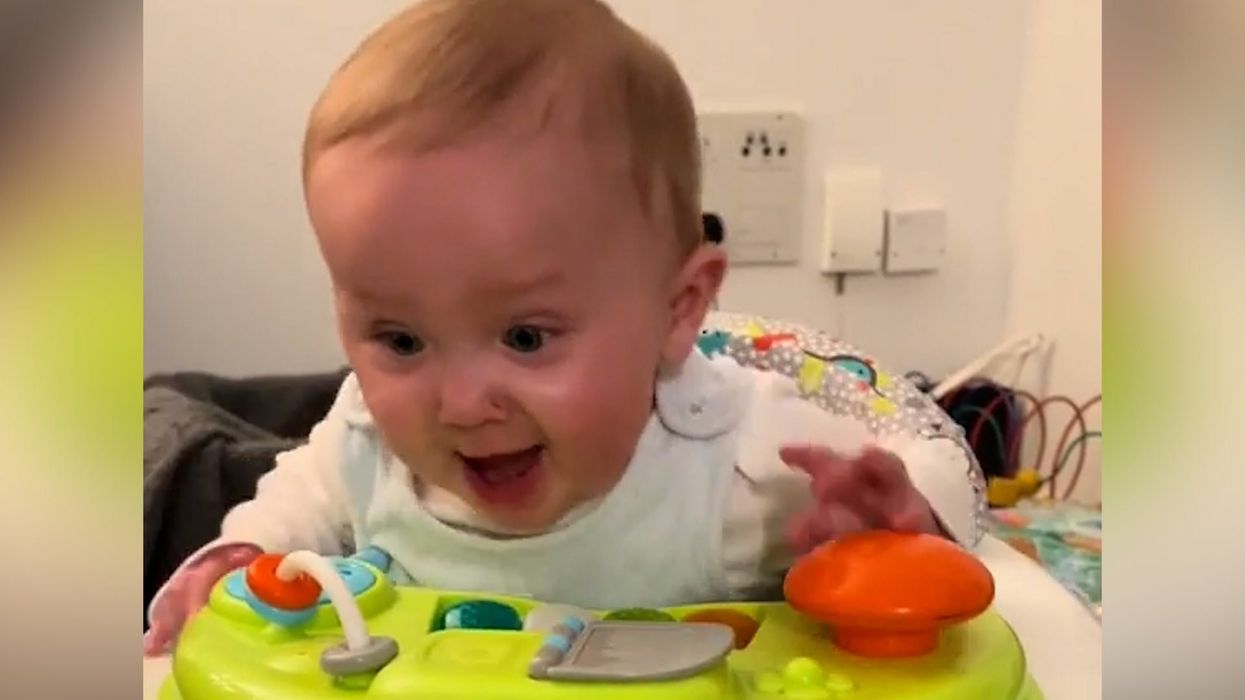Baby loses it every time he hears 1970s hit and it's simply adorable