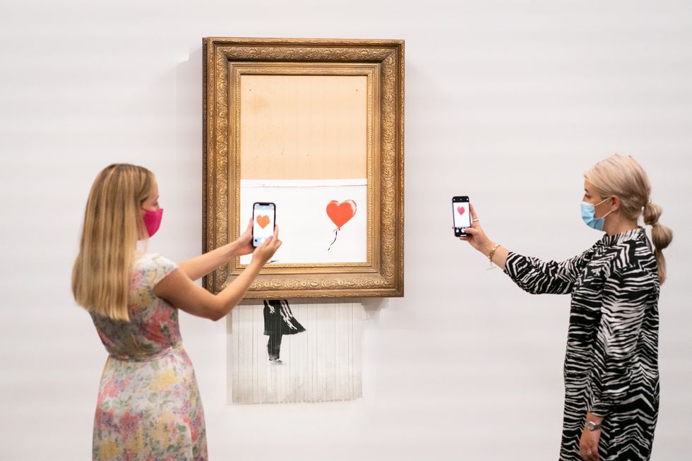 Banksy\u2019s Love Is In The Bin, which self-shredded immediately after it was sold at auction is up for sale again (Dominic Lipinski/PA)