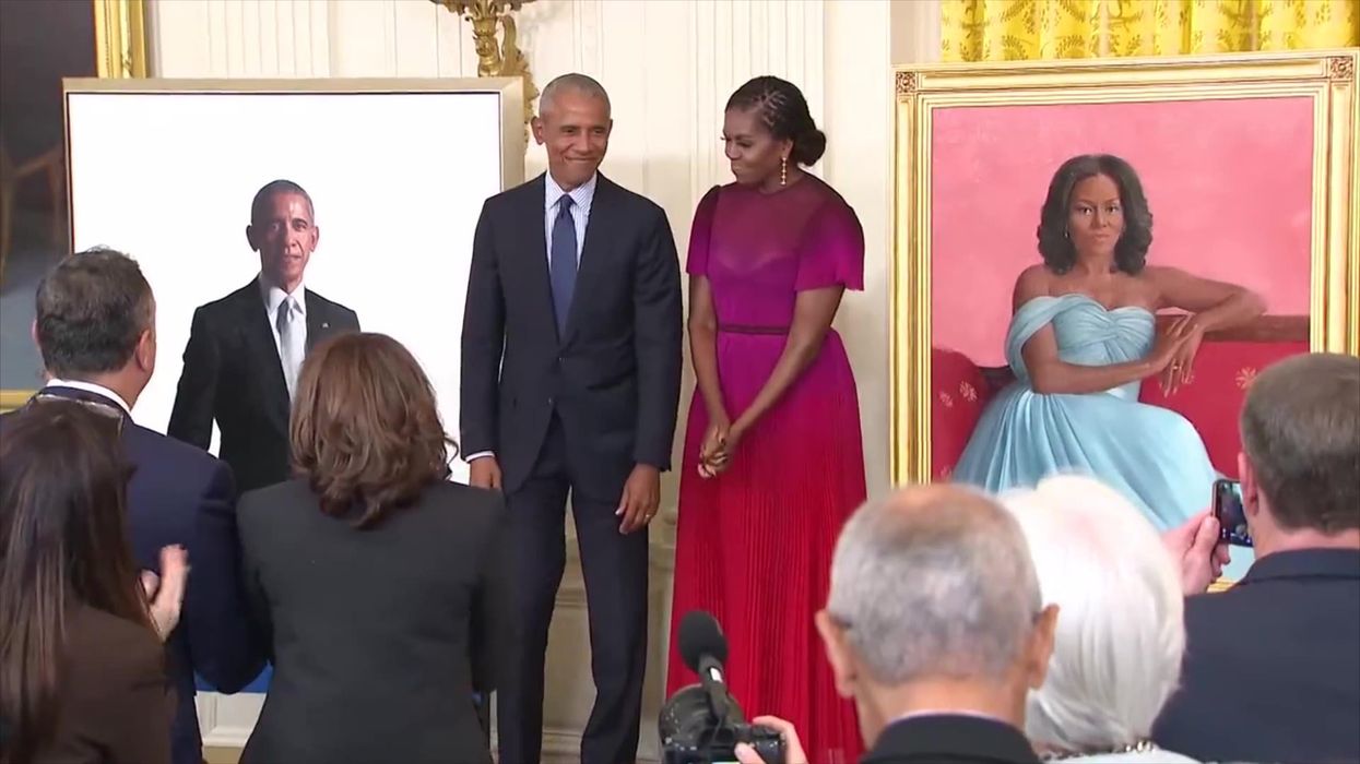 The Obamas' official White House portraits are revealed and the verdicts are in