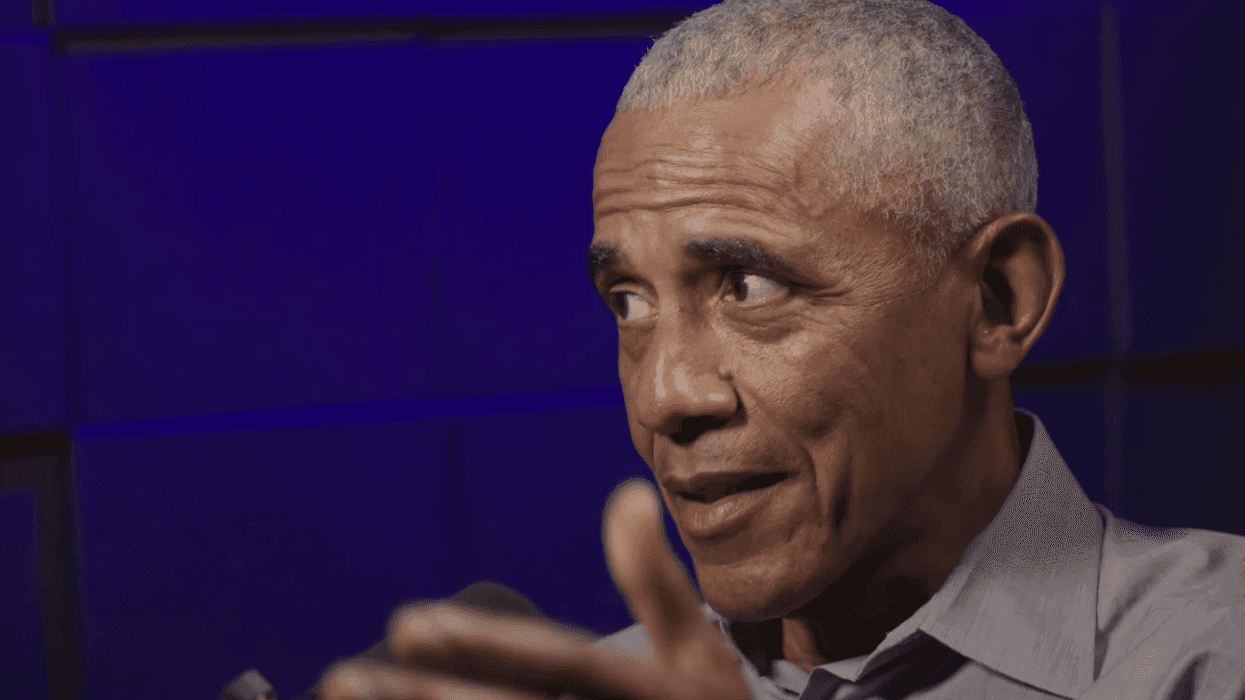 Barack Obama speaking in a podcast studio.