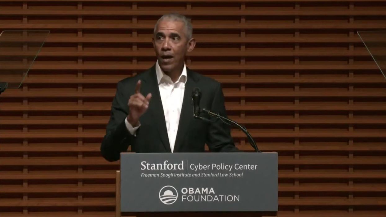 Pic of Obama fist-bumping cleaner goes viral after claims Boris staff abused them