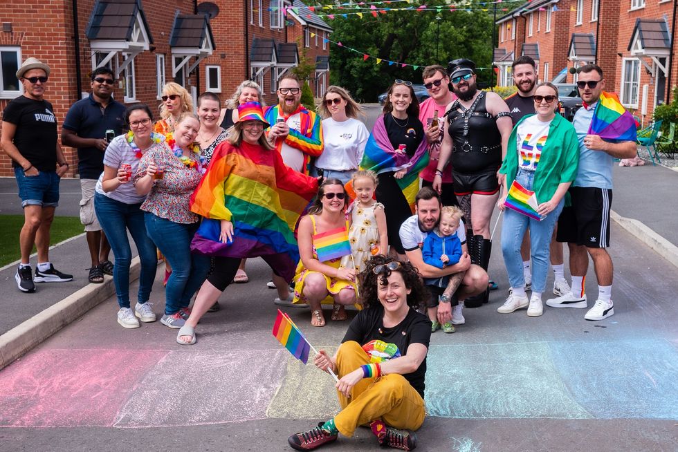 Neighbours join to march 80 metres in one of world’s shortest Pride parades