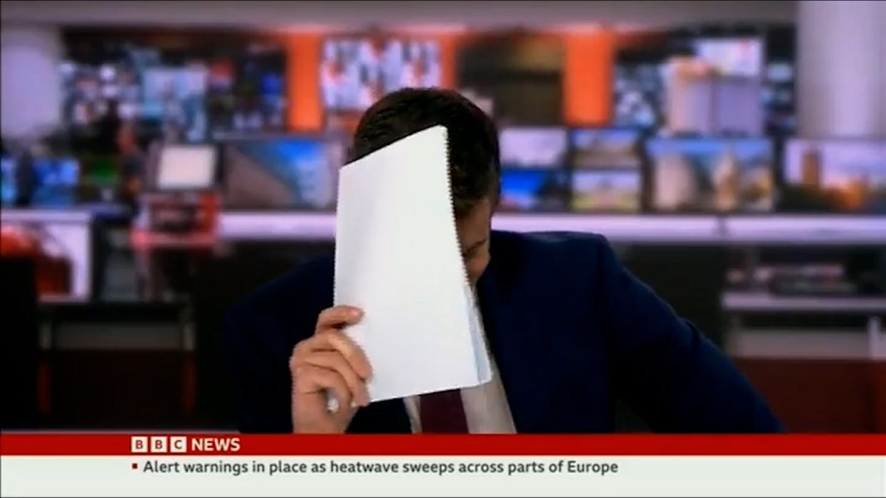 BBC News reporter forced to hide behind notes during story about snakes