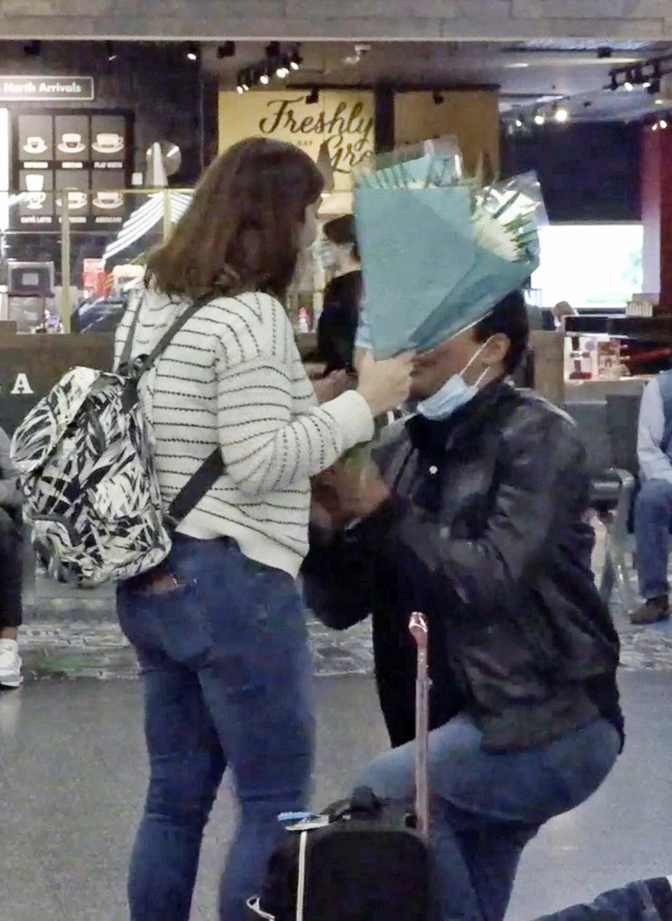 Ben Gilkes goes down on one knee to propose to Cristina Paiva (Karis Pearson/PA)