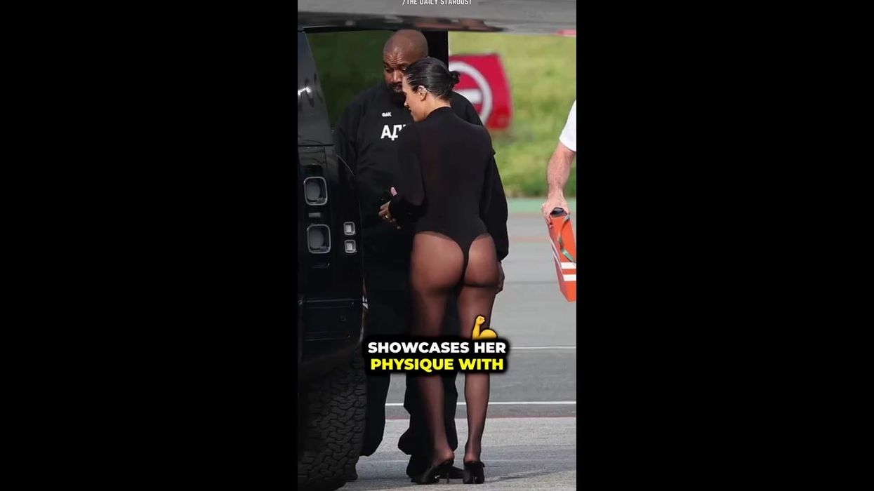 Kanye West's wife covers herself with iPhone as she wears completely see-through outfit for date