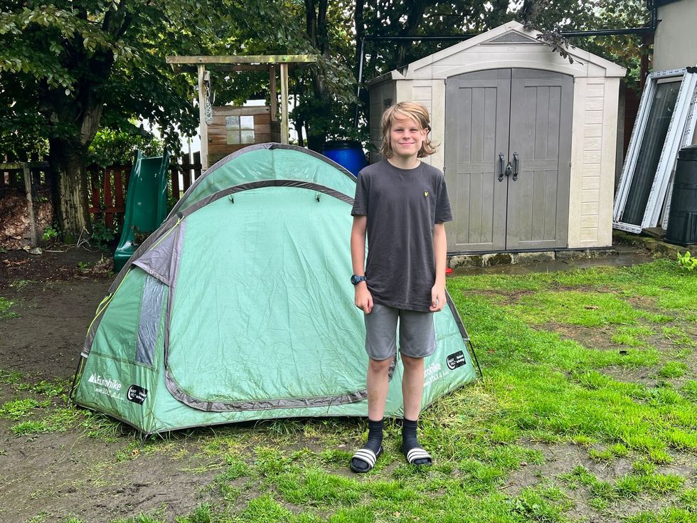 Boy, 13, who has spent more than a year camping in garden aiming to beat record