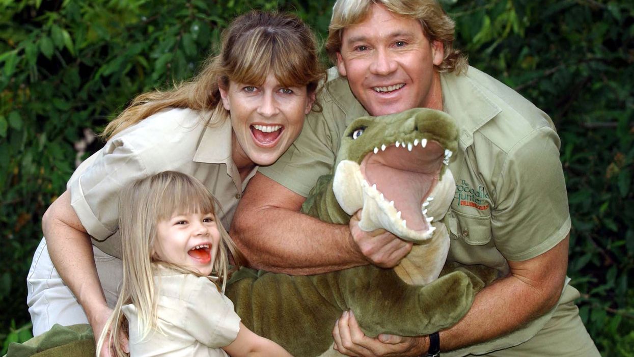 Bindi Irwin at the age of four, with her mother Terri and father Steve (Myung Jung Kim/PA)