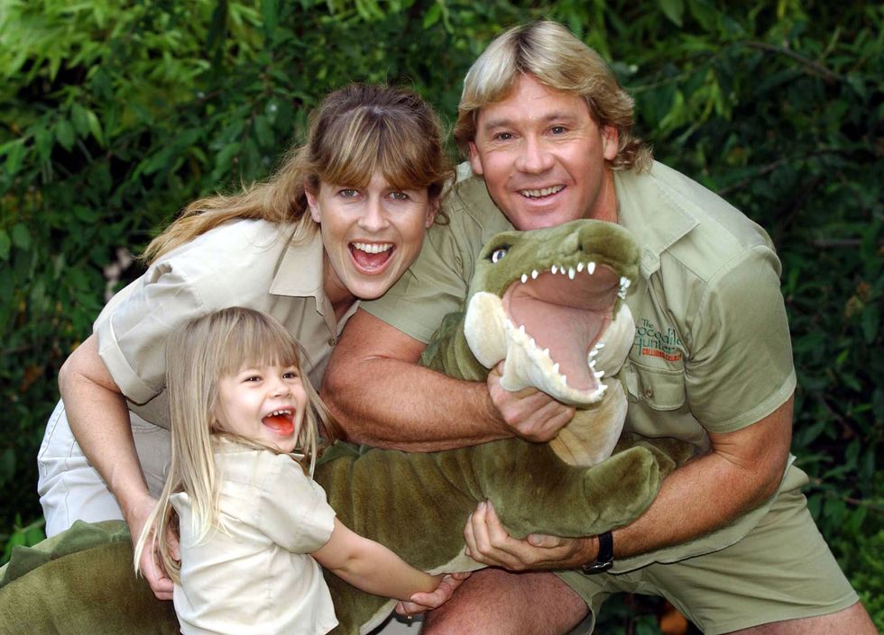Bindi Irwin at the age of four, with her mother Terri and father Steve (Myung Jung Kim/PA)