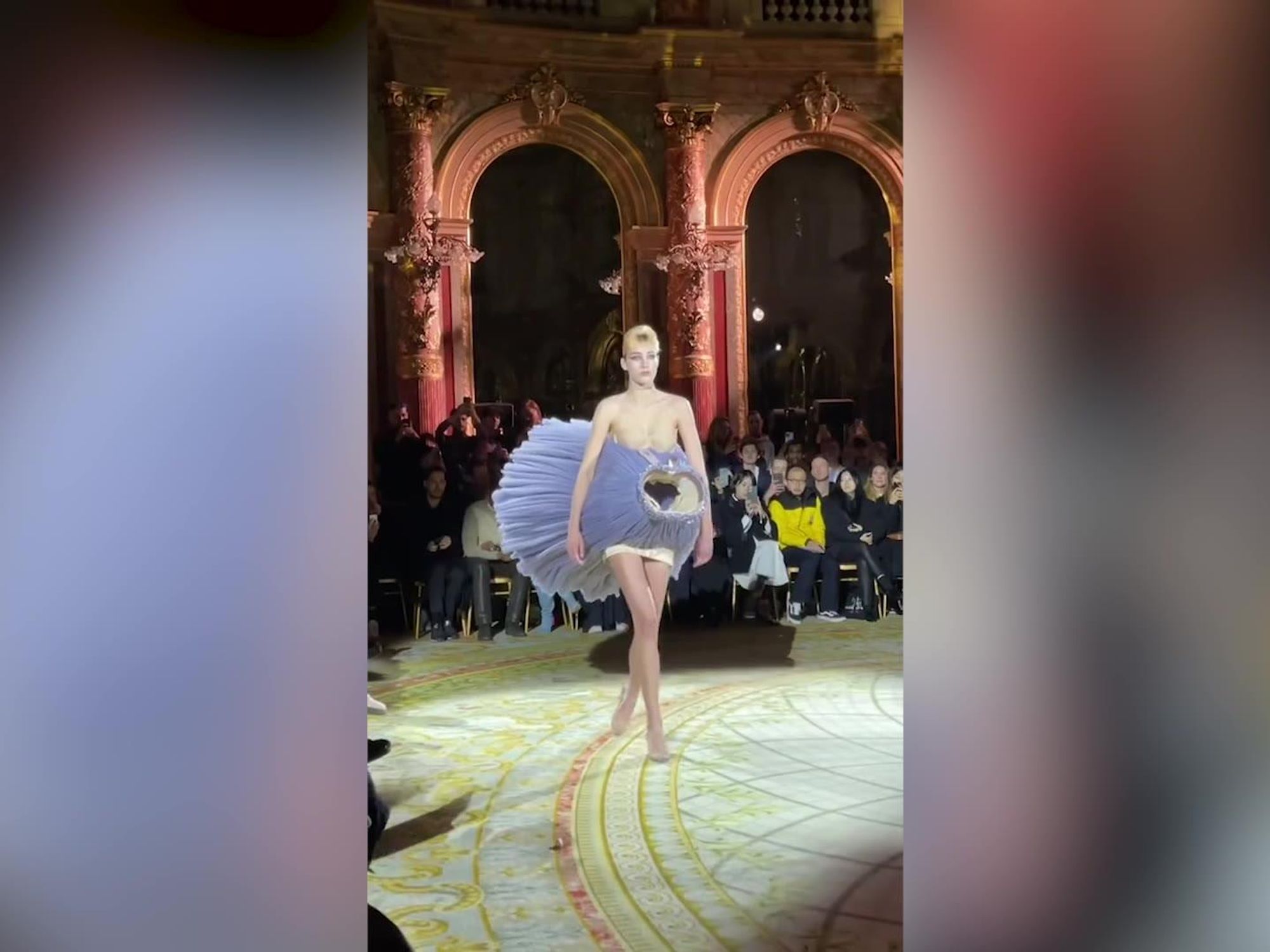 Bizarre Paris Fashion Week show sees models carrying dresses instead of wearing them Bizarre Paris Fashion Week show sees models carrying dresses instead of wearing them