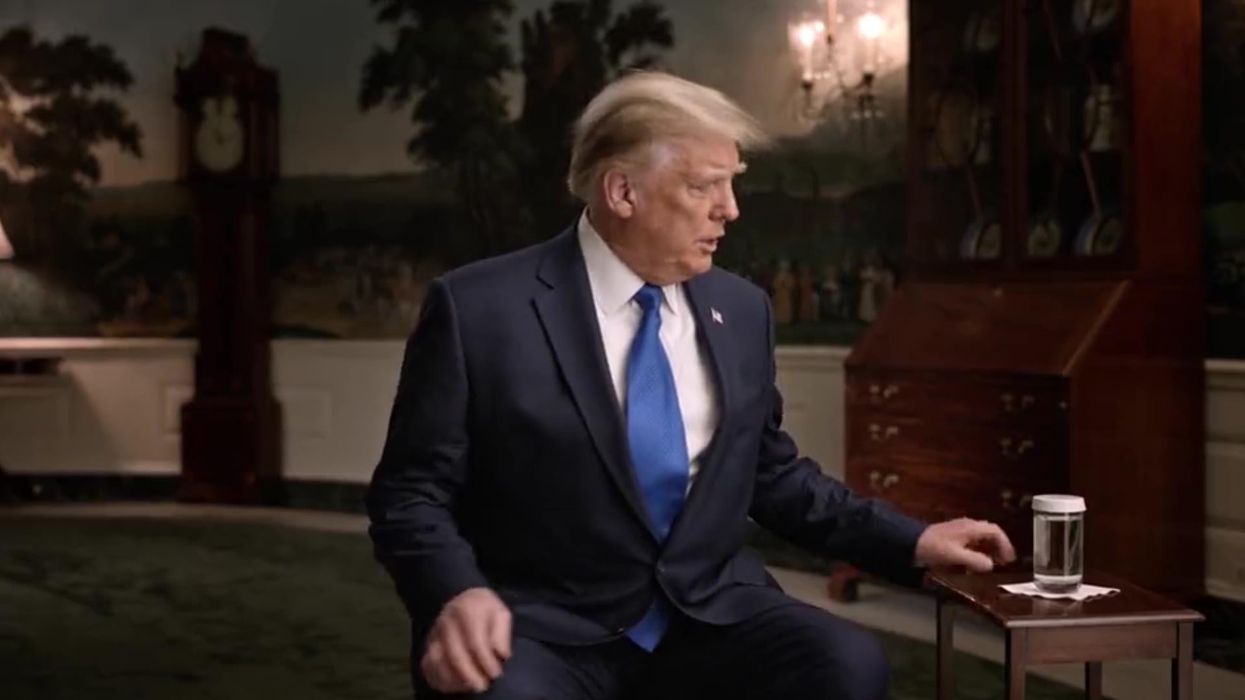 This video of Trump rearranging a glass of water and a table is the strangest thing you'll see today