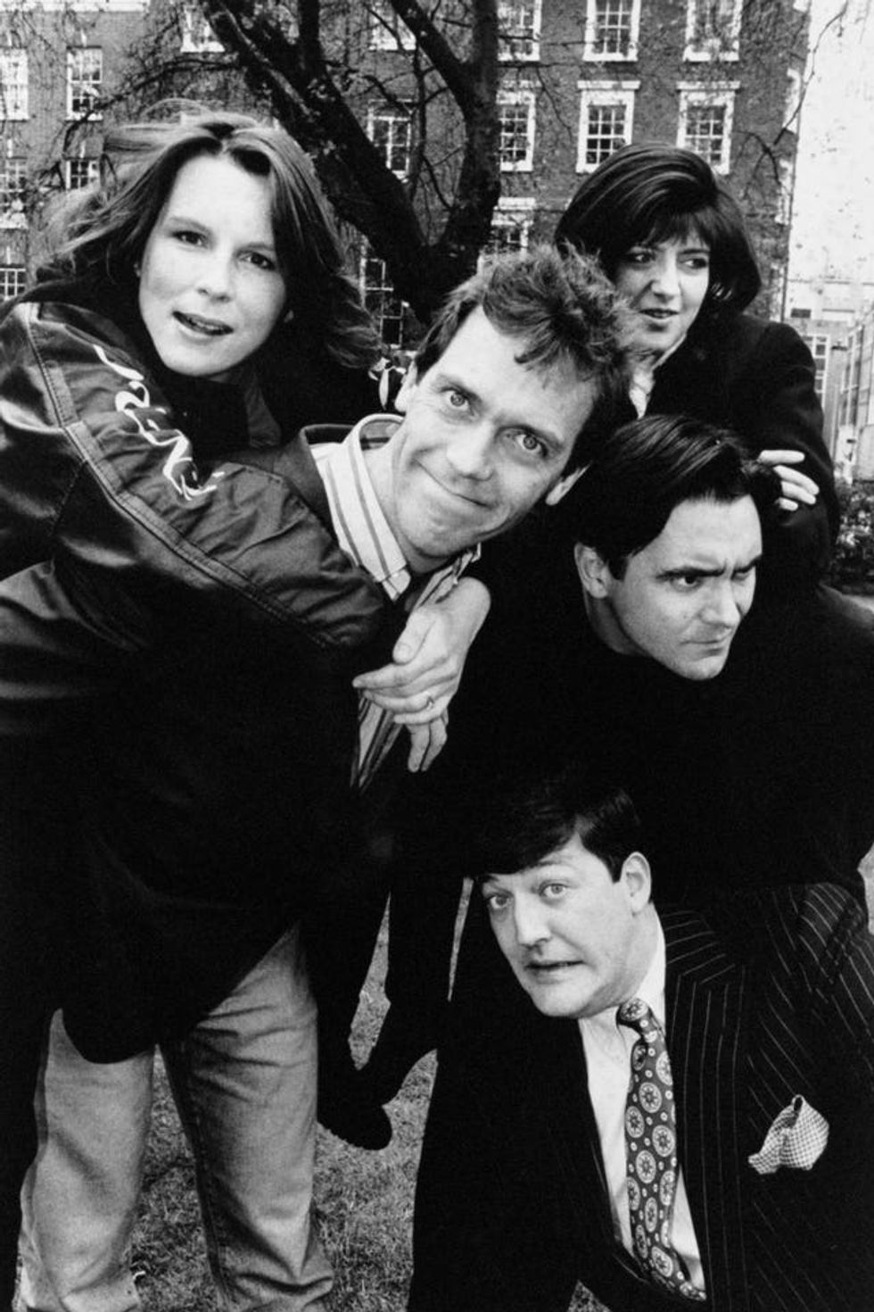 Black and white image of Jennifer Saunders, Hugh Laurie, Emma Freud and Tony Slattery in 1991