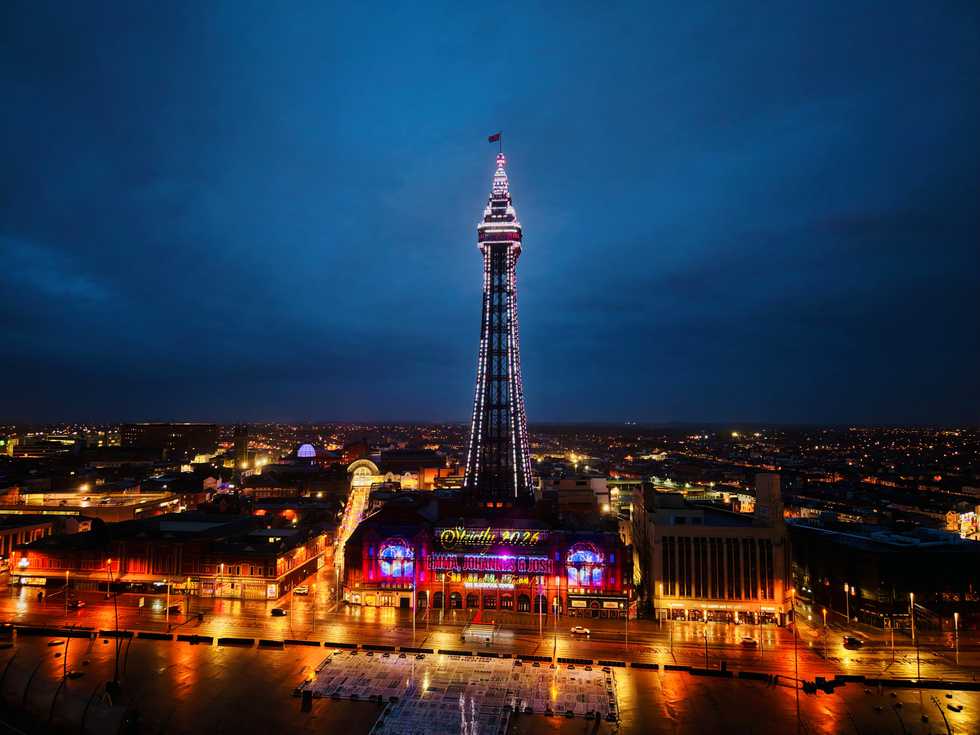 Blackpool Tower lit up with the names of new Strictly Come Dancing presenters